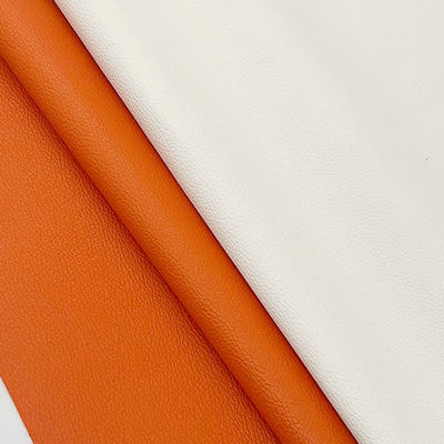 مصنع بيع بالجملة PVC 0.6mm ليتشي نسيج الجلد الزائف الجلد الاصطناعي المصنوع للسيارة كيس مقعد أقدام الزخرفية