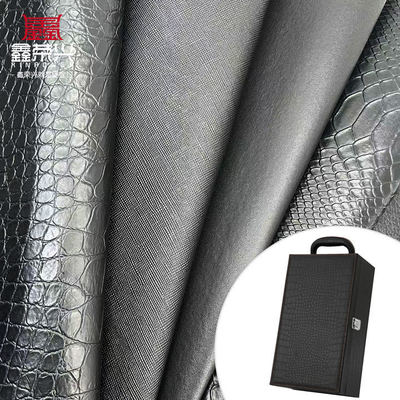 بيع بالجملة PVC الجلد المزيف محفظة صندوق الأحذية دفتر ملاحظات ليتشي الحيوان النسيج الصليب النمط الصناعي الجلد الاصطناعي