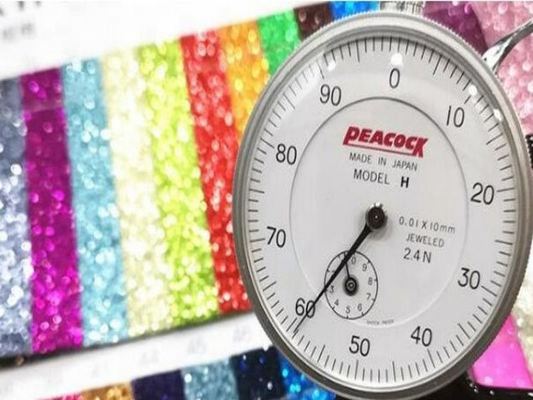 بيع بالجملة PU Glitter Powder Grain الجلد الاصطناعي محفظة المحفظة الأحذية دفتر ملاحظات القماش الجلدي