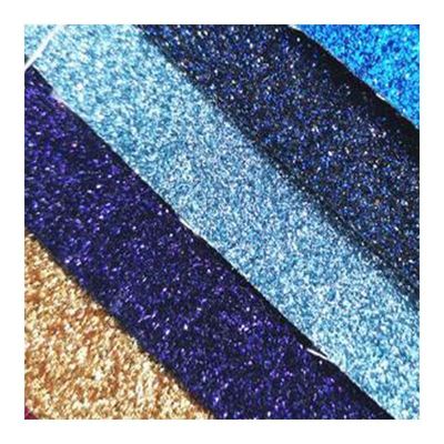 بيع بالجملة PU Glitter Powder Grain الجلد الاصطناعي محفظة المحفظة الأحذية دفتر ملاحظات القماش الجلدي