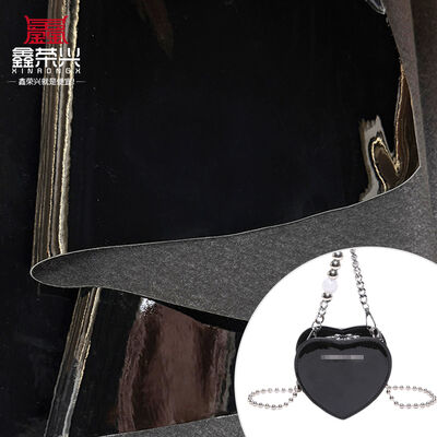 مادة جلد صناعي من البولي فينيل كلورايد (PVC) للمرايا والحقائب والأرائك والأحذية والمفارش وتنجيد أثاث السيارات وأحزمة الكراسي الزخرفية